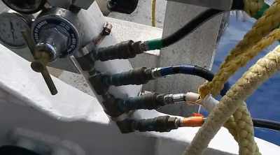 There's just a hose that
goes to a compressor - Shark Attack Files