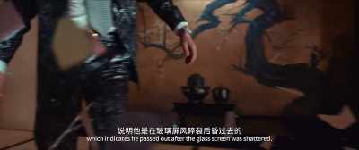 There's splintered glass beneath him - Detective Chinatown 3
