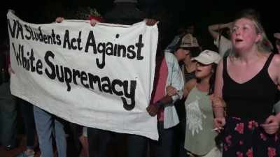 They are completely surrounded inside
the group of torchlight demonstrators. - Alt-Right: Age of Rage