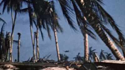 They are pinned
down by enemy fire, - The Pacific War in Color