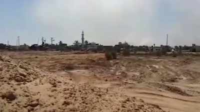 They are stationed just outside Khuza'a, - Killing Gaza