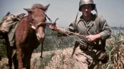 They commandeer local
horses and take joyrides. - The Pacific War in Color