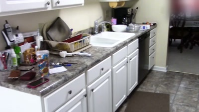 They get into the kitchen area. - Killers: Caught on Camera