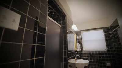 They had this huge
full-size bath right
behind the kitchen - Why the Heck Did I Buy This House?