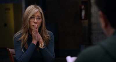 They hold each other's gaze. - Friends: The Reunion