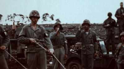 THEY IDENTIFIED HIM
AMONG THE OTHER BODIES - The Pacific War in Color