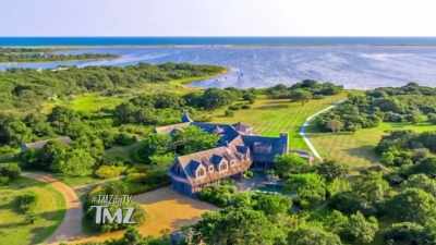 They just bought
a 6,900-square-foot home - Trump Card