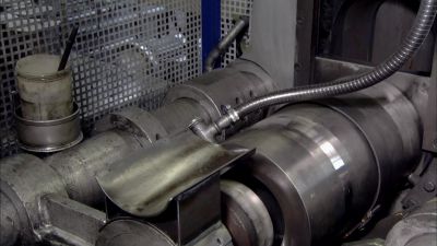 THEY LOAD EACH CURED BLOCK
INTO A HYDRAULIC PRESS, - How It's Made