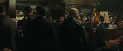 They looked around the bar
self-consciously, - Molly's Game