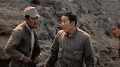 They report Japanese are still
inside, and won't surrender. - The Pacific War in Color