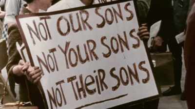 THEY SAY THE WAR
IS ILLEGAL AND IMMORAL. - America in Color