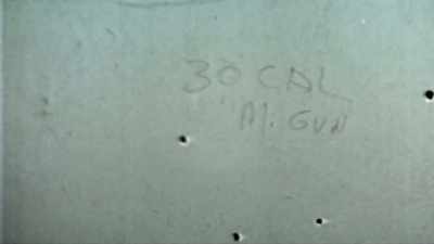  - They sprayed this wall with
 .30-caliber machine gun fire. - The First Rainbow Coalition