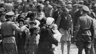 - They started screaming,
"Men and boys into one column. - The Accountant of Auschwitz
