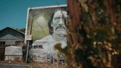 They started work
on this giant mural of him - Inmate #1: The Rise of Danny Trejo