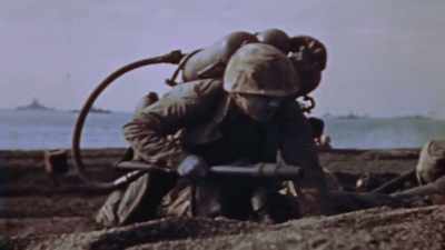 They struggle in
the fine volcanic ash. - The Pacific War in Color