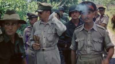 They survey the scene --
including dead Japanese. - The Pacific War in Color