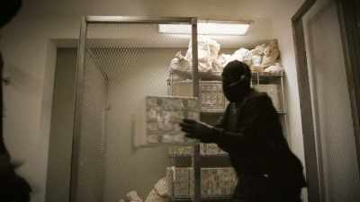They take the cash
in the plastic shrink wrap - History's Greatest Heists with Pierce Brosnan