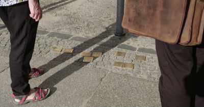 They're called stolpersteine,
stumbling stones. - Getting Away with Murder(s)