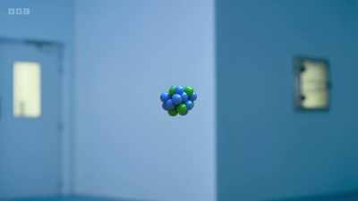 Think of an atom as a tiny
positively charged nucleus - Secrets of Size: Atoms to Supergalaxies