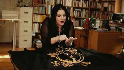 This is a Roman coin that
has had this fitting attached - Raiders of the Lost Past with Janina Ramirez