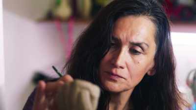This is Angiani. She
specialises in clay work. - This Giant Beast That is the Global Economy