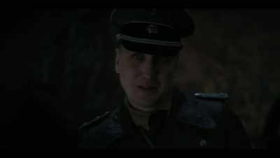 This fool is taking a military-issue
Walther PPK from its holster. - All the Light We Cannot See
