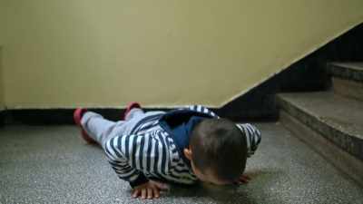 This kid is a tough cookie. - Photographer