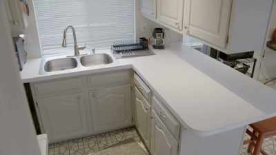 This is like cooking
in a Winnebago in here. - Renovation Impossible