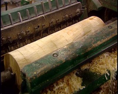 THIS LOG IS BEING TRANSPORTED
TO THE NEXT PROCESSING STAGE. - How It's Made