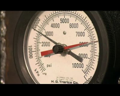 THIS MACHINE TESTS
THE STRENGTH OF THE COVER - How It's Made
