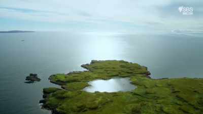 This is the Rubha an Dunain
peninsula, with its tiny loch. - Scotland from the Sky