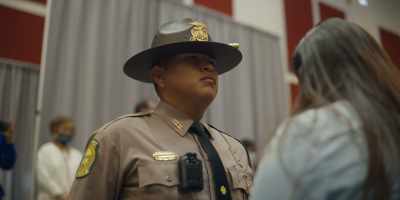 This time you may take
the shield and pin your recruit. - Navajo Police: Class 57