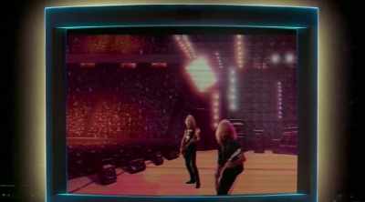 This was way before Guitar Hero - Insert Coin