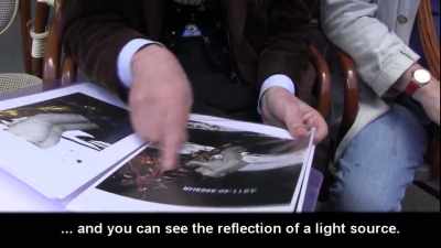 This white line
is the reflection of a light, - American Moon