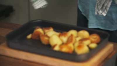 Those are tip-top
roast potatoes. Look at them. - James May: Oh Cook!