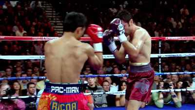 Those two punches have
reddened Oscar's face already. - The Golden Boy
