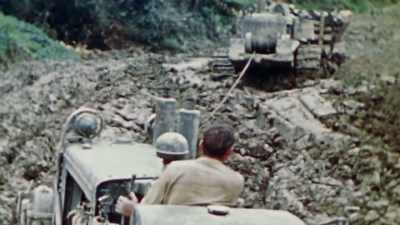 Three feet down in the mud,
so they couldn't haul it to us. - The Pacific War in Color