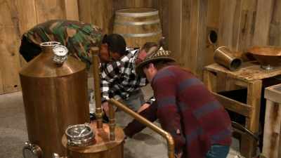 -Three moonshiners.
-[laughs] - Moonshiners: Master Distiller
