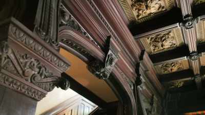 Three stories of intricate
woodwork, tile floors, - Christmas at the Chateau