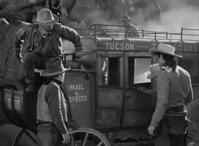 - Throw down the box.
- There ain't no box up here. - Tombstone: The Town Too Tough to Die