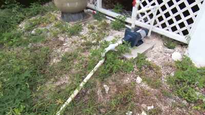 Tim has taken the old
pump from the pool system - Island of Bryan