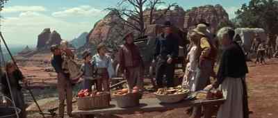 Time for the feed bag, eh, folks? - The Last Wagon