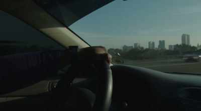♪ Timeless by Kenneth Brother
playing on car stereo ♪ - Algiers, America