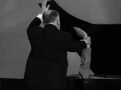To continue our little chat about
musical appreciation, - Alfred Hitchcock Presents