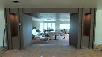 To see completed millwork
in between these two spaces, - Island of Bryan