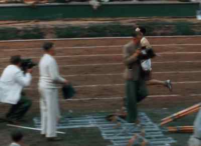 Tom Richards of Great Britain
a good second. - XIVth Olympiad: The Glory of Sport