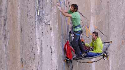 Tommy sets up his belay, - The Dawn Wall