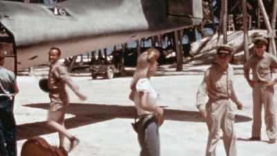 Touching down on this
dusty airstrip on Tarawa -- - The Pacific War in Color