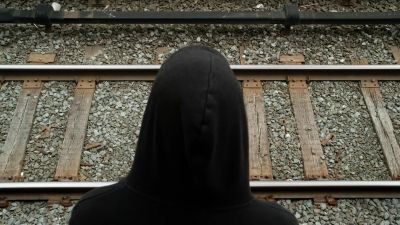 (TRAIN ANNOUNCEMENT OVER PA) - Mr. Robot