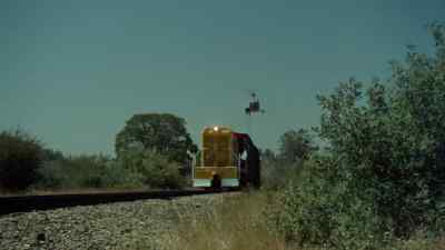 [train bell ringing] - The Helicopter Spies